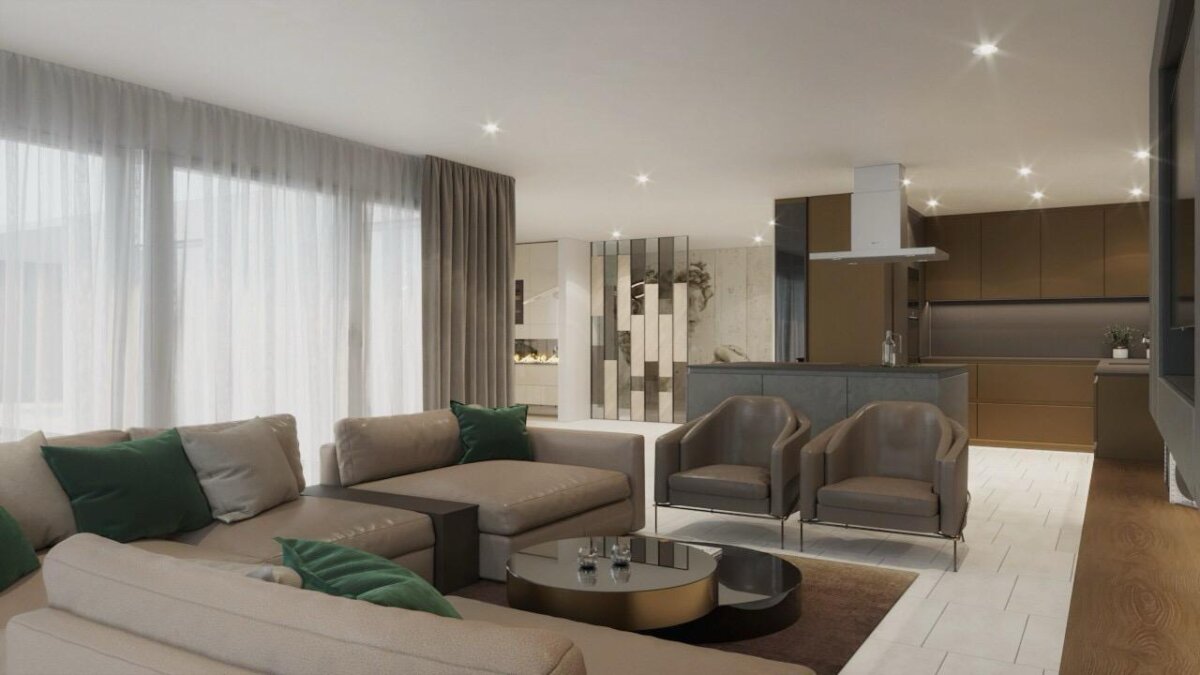 Wohnzimmer der Haustransformation in Zürich: Sofalandschaft mit Blick in die offene Küche